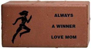 Brick with Special Graphic of a female runner that reads "Always a winner love mom"