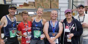 Charity bib runners gather at the post-race party.