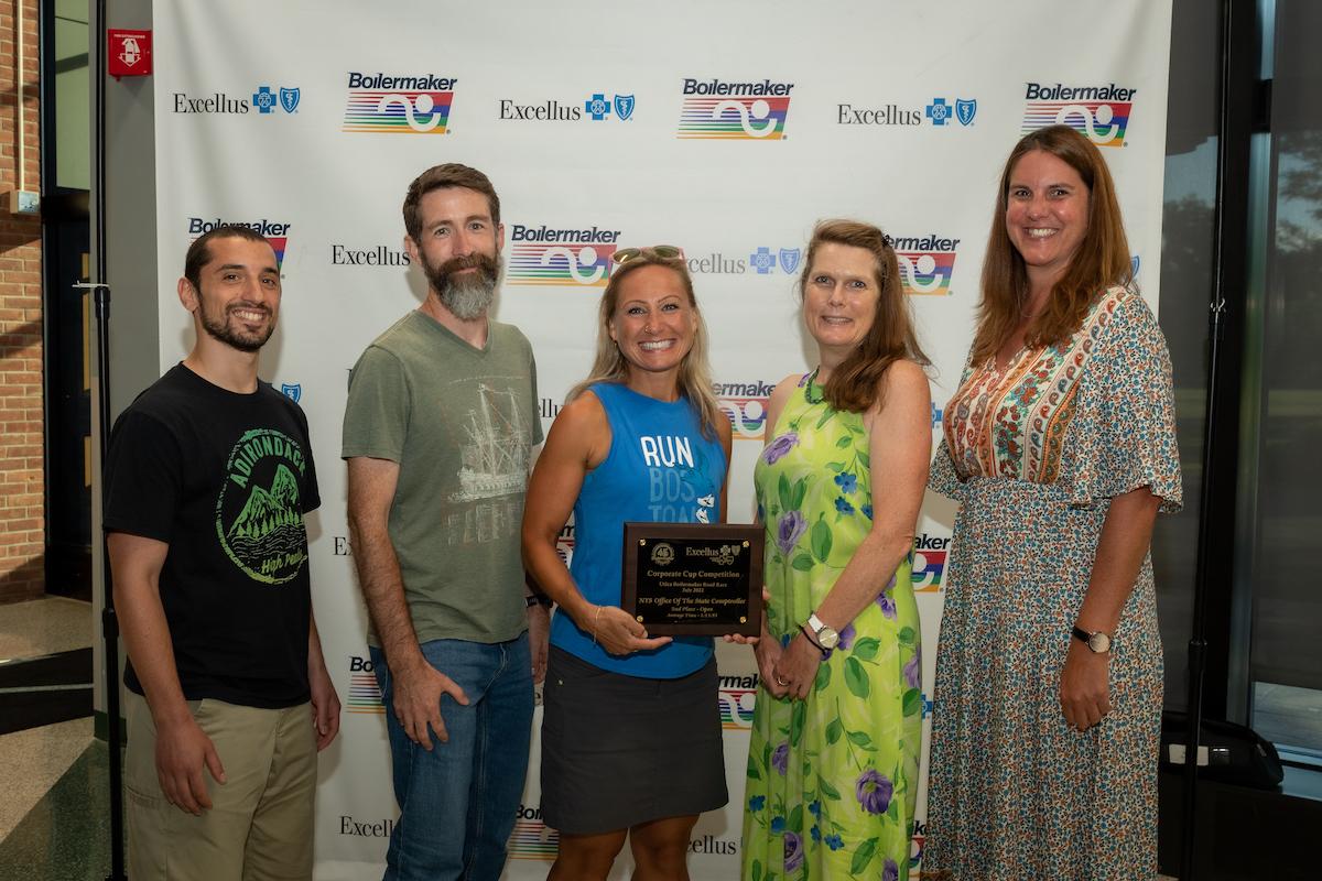 The NYS Office of the State Comptroller team accepts their Boilermaker Corporate Cup award.