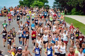 Runners run near Mile 1 of the 2023 Boilermaker Road Race 15K.