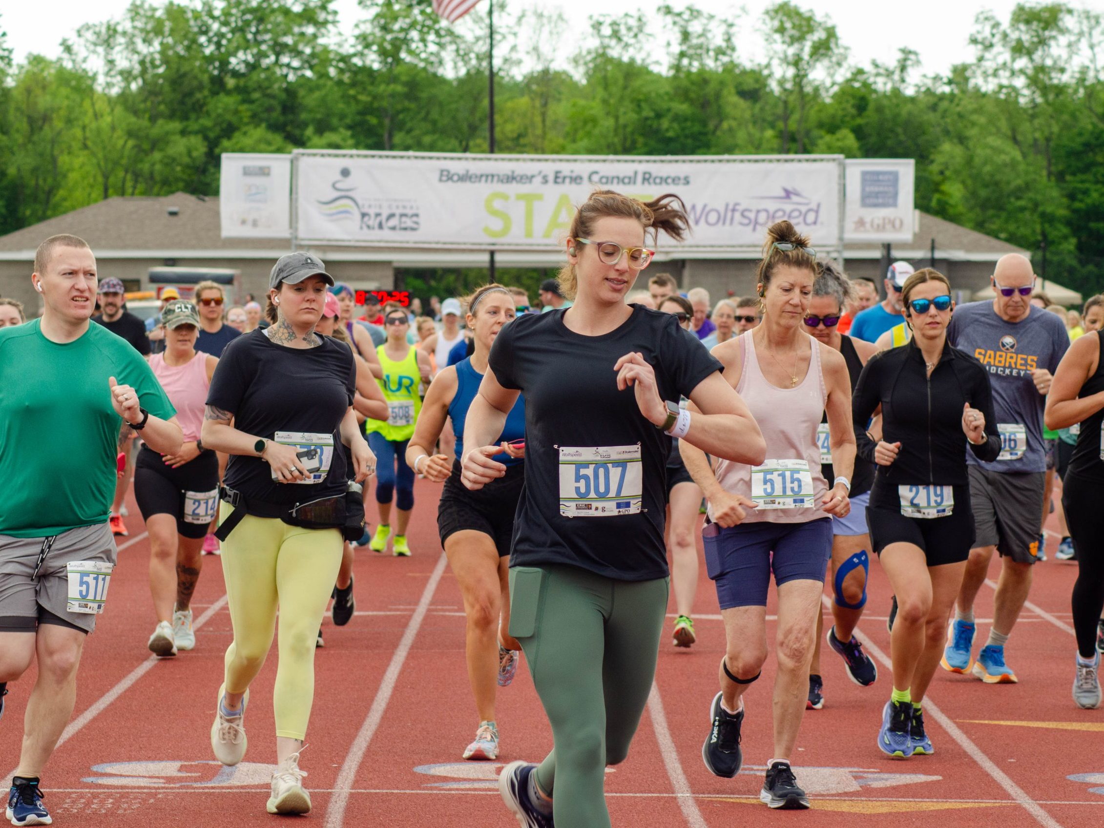 Runners at the start of the Erie Canal Races take off
