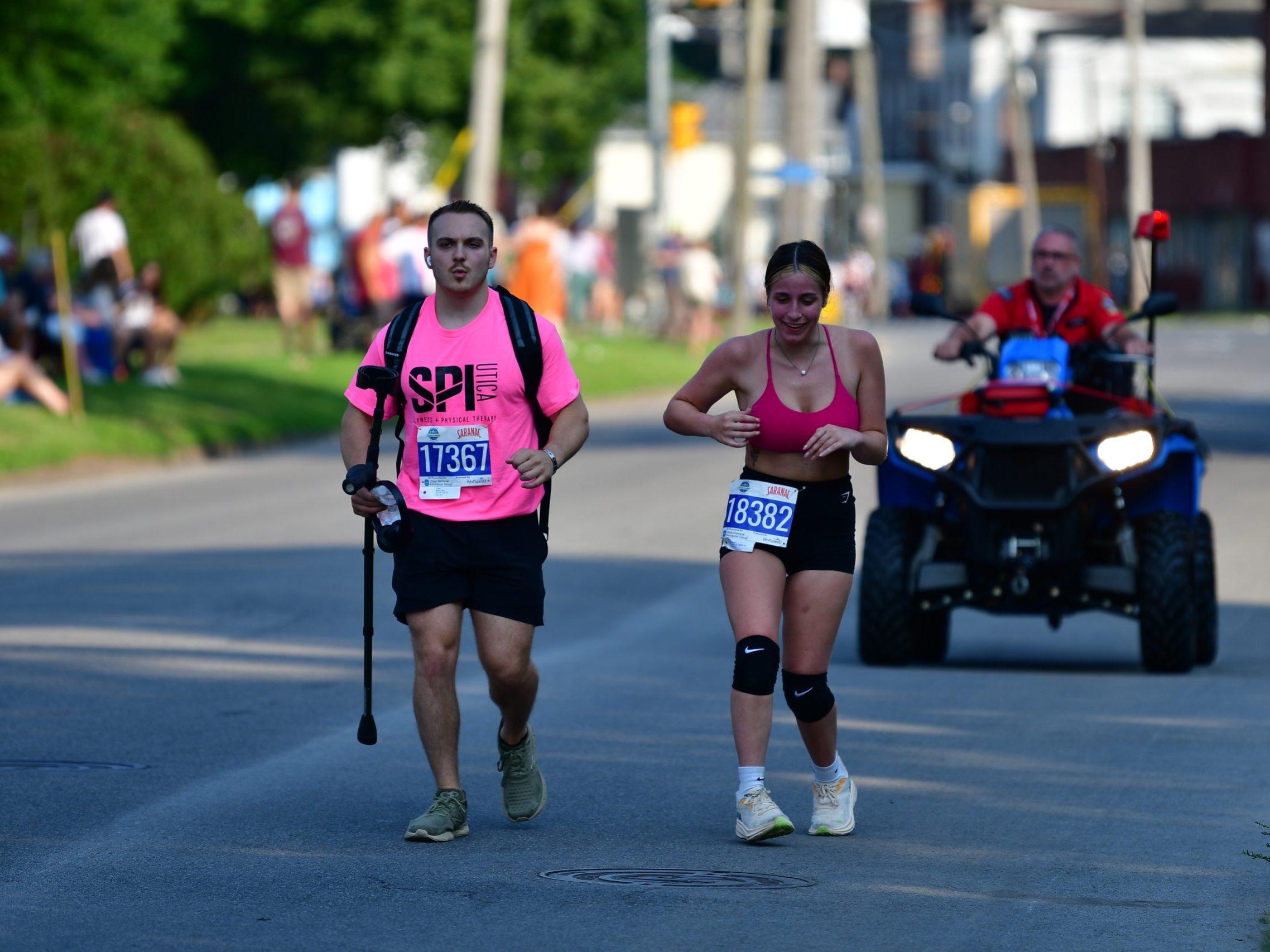 Two participants along the course of the Boilermaker 5K