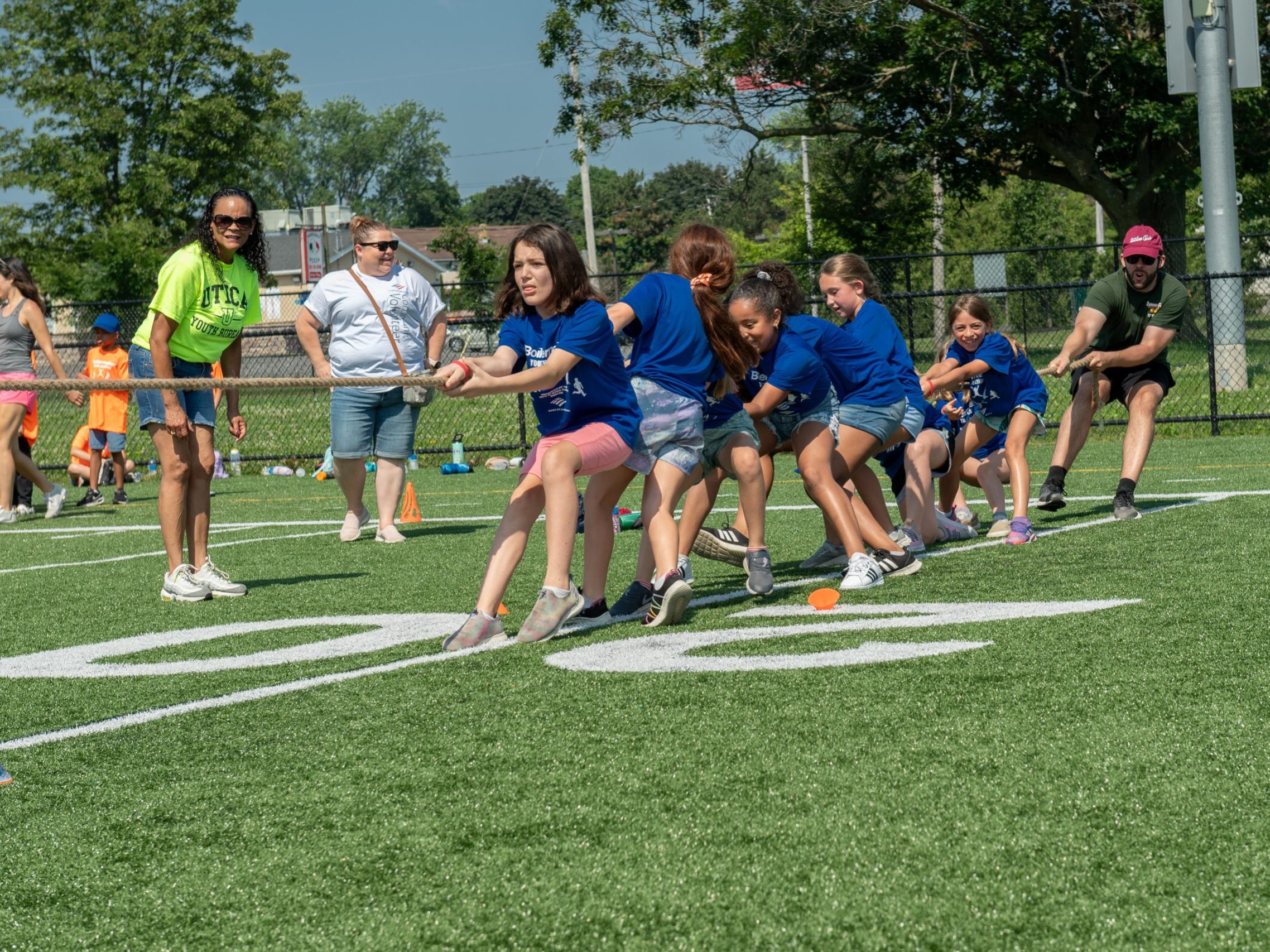 Participants of the 2023 Boilermaker Youth Olympics compete in a tug of war rope game